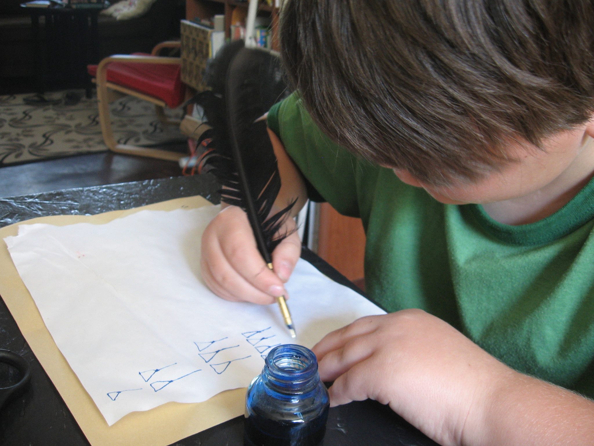 child exploring ancient writing