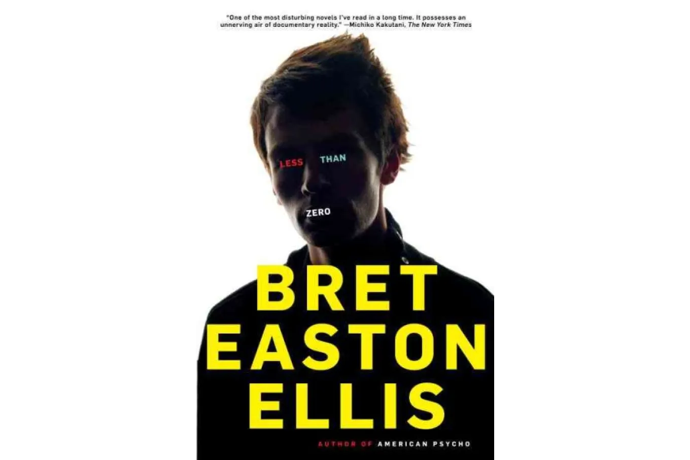 Cover image - a shadowy headshot of an unsmiling young man dressed in black against a white background. The words "less" and "than" cover his eyes, and the word "zero" covers his mouth.